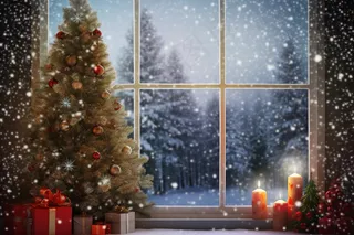 圣诞装饰喜庆礼物红色窗外下雪摄影图