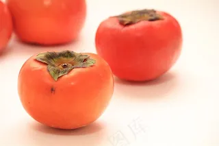 成熟的柿子摄影图片