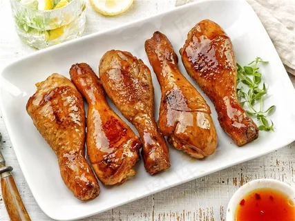 美味的烤鸡腿高清摄影图 美味的烤鸡腿高清摄影图