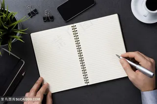 写字的商务人士高清图片