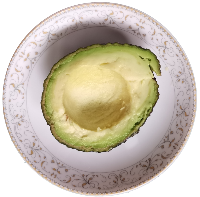 梨形瓷碟带核半个牛油果切开去核果绿色油脂瓤免抠摄影实拍实物元素素材