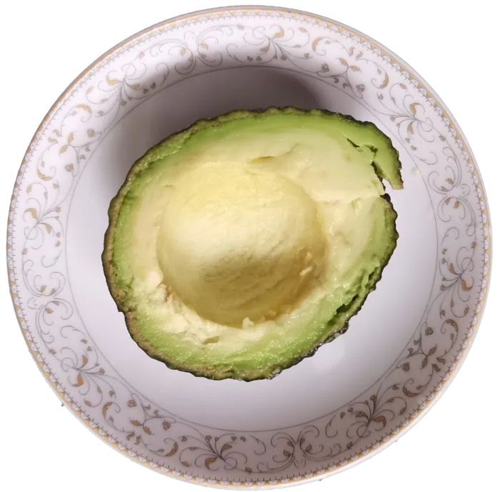 梨形瓷碟带核半个牛油果切开去核果绿色油脂瓤免抠摄影实拍实物元素素材psd模版下载