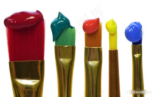 沾着彩色颜料的绘画画笔摄影素材