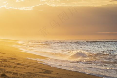海滩海洋日出海日落水天空