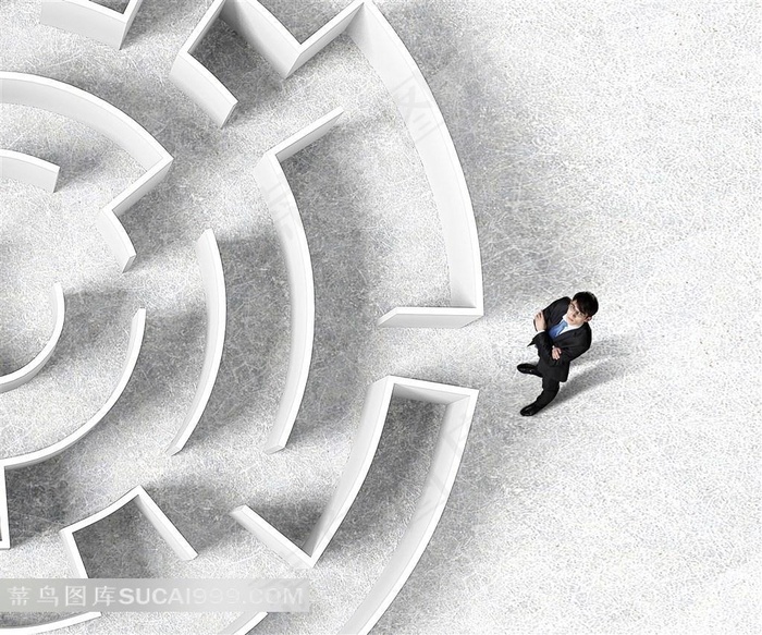 正在迷宫入口徘徊的商务人士高清图片