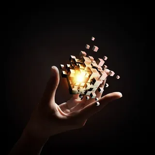 黑色背景下的手掌中的魔方高清摄影 黑色背景下的手掌中的魔方高清摄影