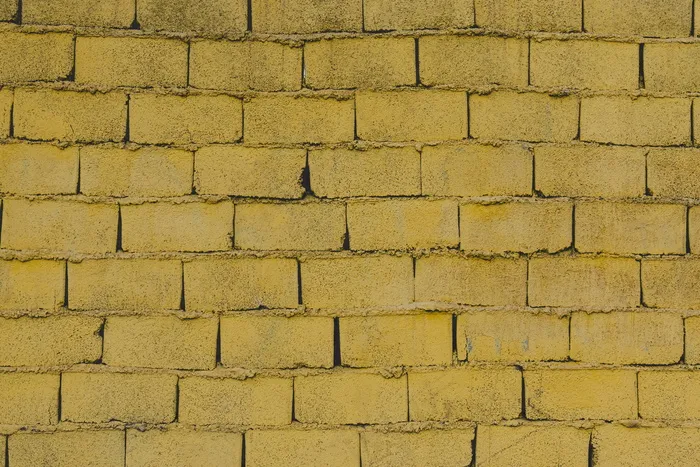 黄色砖墙背景照片