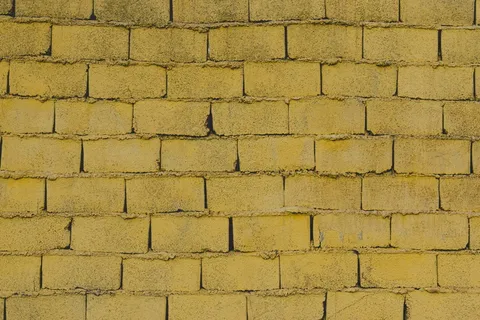 黄色砖墙背景照片