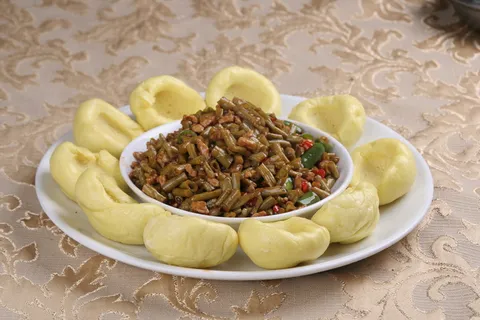 14 酸豆角牛肉粒-西关人家粥源店