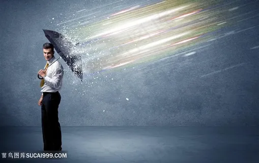 拿着雨伞的商务男士高清图