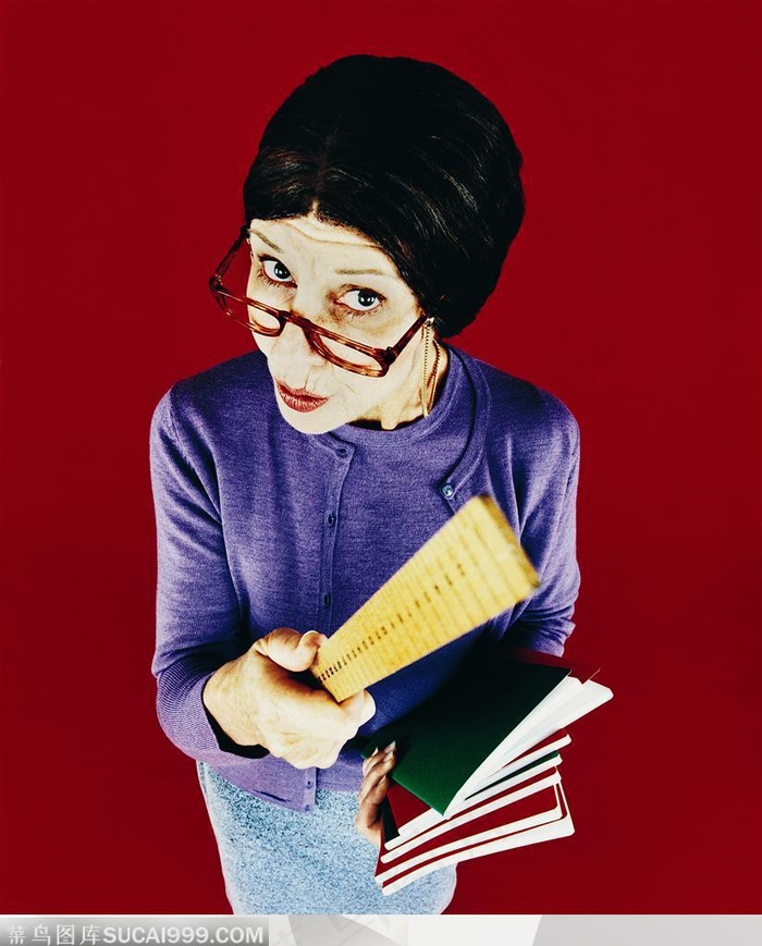 超级个性人物-收拿书本和尺子的外国女老师