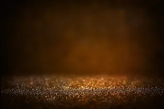 金色粒子虚化背景高清图片