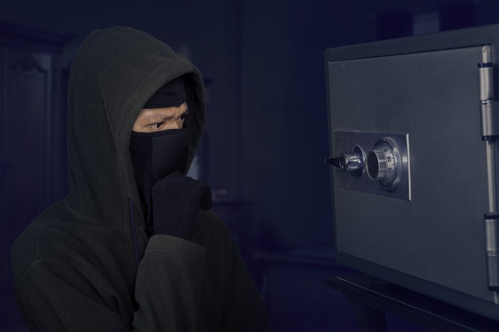 撬保险箱摄影高清图片