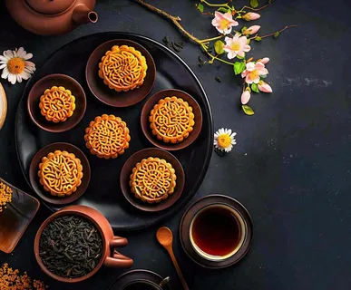 中秋美食月饼中国传统糕点摆盘装饰泡茶摄影图