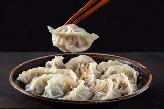 饺子中国传统美食冬至吃饺子摄影图