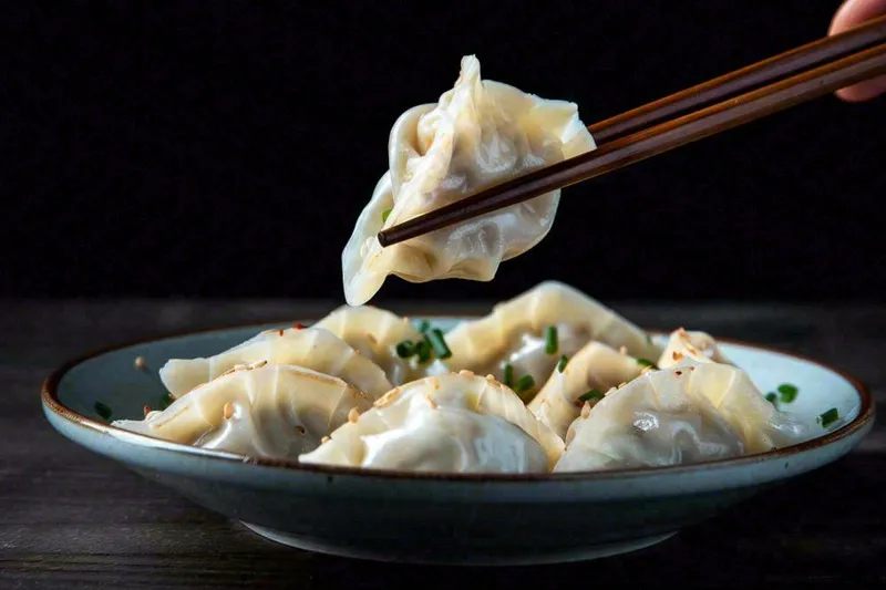饺子中国传统美食冬至吃饺子摄影图(1344x896)