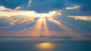 清晨日出朝霞云层山川摄影图