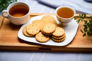 营养早餐日式小圆饼喝茶摄影图