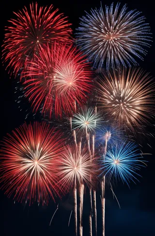 烟花五颜六色的烟花庆典新年节日暮色的天空背景摄影图