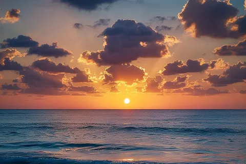 海上清晨日出朝霞云层摄影图