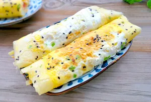黄金鸡蛋卷饼美食图片
