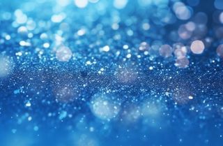 蓝色闪光颗粒光晕灯光摄影背景图