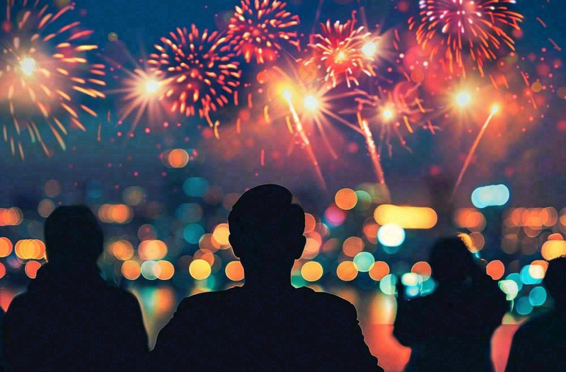 烟花绽放节日人物剪影背景庆祝小年除夕夜背景