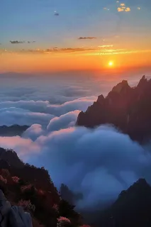 清晨日出朝霞云层山川摄影图