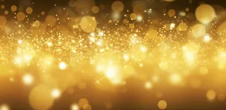 金色闪光颗粒光晕灯光大气耀眼摄影背景图