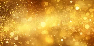 金色闪光颗粒光晕灯光大气耀眼摄影背景图