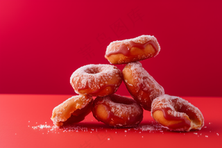 中式甜甜圈油饼子年货美食红色背景甜点摄影图
