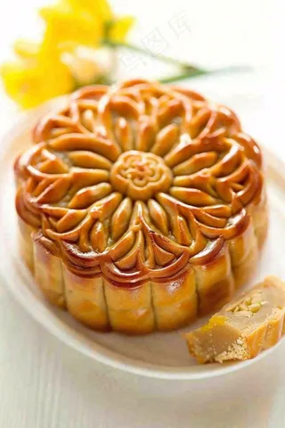 精美月饼中秋美食小清新鲜花装盘摄影图