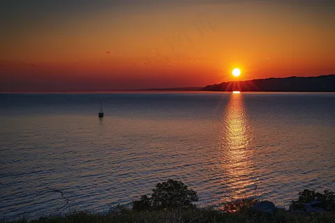 夏日落日海报沙滩晚霞摄影图