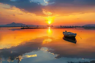 落日海洋沙滩夕阳晚霞摄影图 