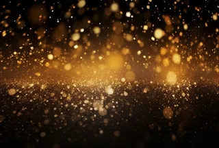 黑金色大气闪光粒子金色尘粉光晕灯光摄影背景图