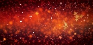 红色闪光粒子雪花光晕灯光喜庆摄影背景图