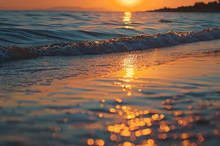 海上日出朝霞海浪摄影图