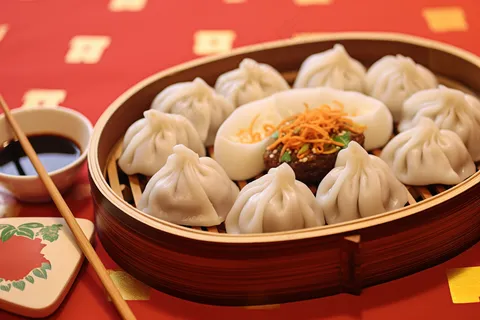 饺子包饺子新年团聚吃饺子美食摄影图 饺子包饺子新年团聚吃饺子美食摄影图