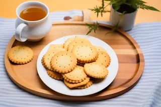 营养早餐日式小圆饼喝茶摄影图