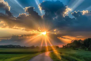 清晨日出朝霞云层山川摄影图