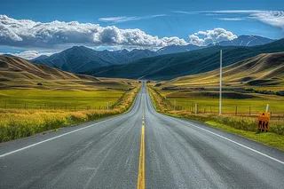 高原草地公路高山白云摄影图