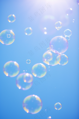 蓝天下飞行的肥皂泡梦幻摄影图