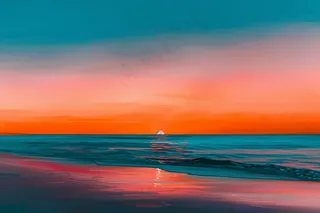 落日海洋沙滩夕阳晚霞摄影图 