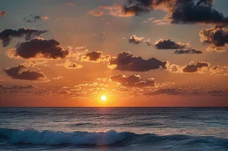 海上清晨日出朝霞云层摄影图