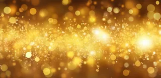 金色闪光颗粒光晕灯光大气耀眼摄影背景图