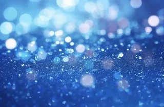 蓝色闪光颗粒光晕灯光摄影背景图