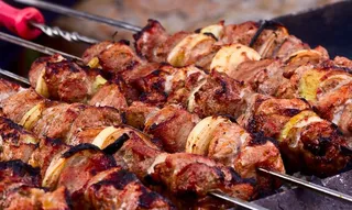 烤肉骨肉相连美食背景海报素材图片