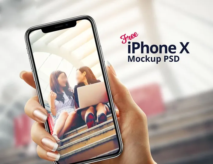 手持手拿iPhoneX苹果手机图片