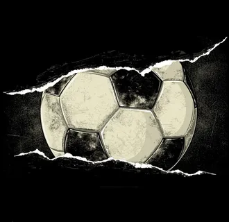 手绘撕裂纸张里的斑驳足球图片