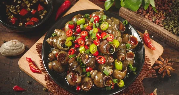 特色美食爆炒田螺图片 特色美食爆炒田螺图片